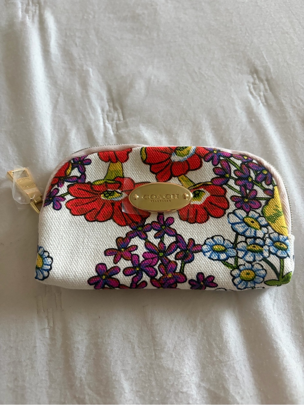 Brand New Coach Mini Pouch. Dimensions: 5” x 3”